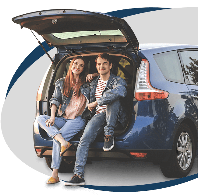 a man and woman sitting in the back of their car that is insured by Secure Solutions in mt sterling ky